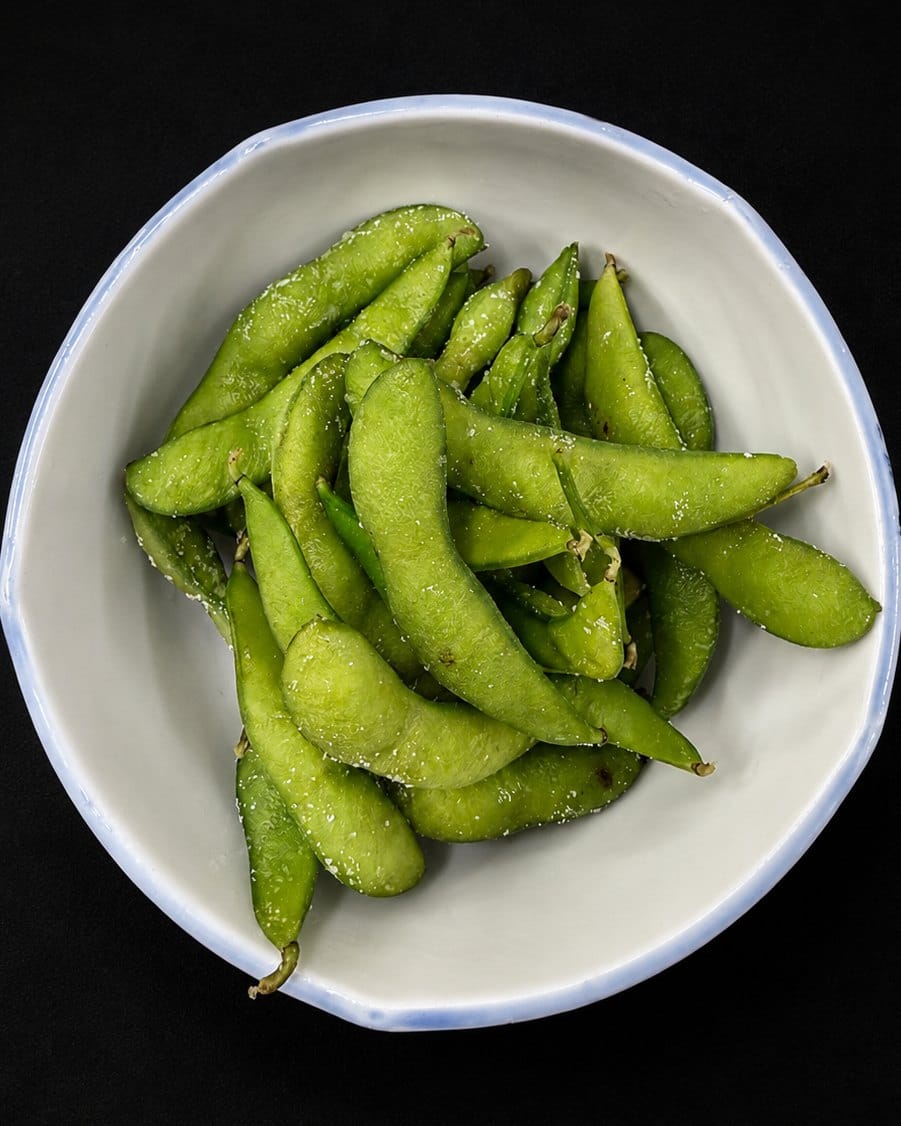 A bowl of salted edamame
